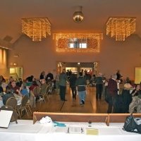 11/28/10 - 32nd Annual Giulio Francesconi Charity Raffle - Upstairs Ballroom, Italian American Social Club, San Francisco - As the drawing dinner gets doing, the Bottarini table is the first on the left; Dick Johnson, chairman, is standing left-center down the aisle