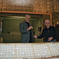 11/28/10 - 32nd Annual Giulio Francesconi Charity Raffle - Upstairs Ballroom, Italian American Social Club, San Francisco - Charlie Bottarini, right, hands Dick Johnson the next winning number. Announcing the winners was a bit clunky as they had to look up the number on a list to see who won.