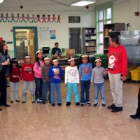 12/17/10 - Annual Christmas with Santa - Mission Education Center, San Francisco - Principal Deborah Molof, right, and her assistant, left, help the first grade class line up with their teacher for their visit with Santa.