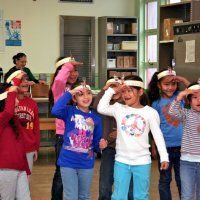 12/17/10 - Annual Christmas with Santa - Mission Education Center, San Francisco - The first grade class singing a song for Santa.