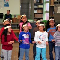 12/17/10 - Annual Christmas with Santa - Mission Education Center, San Francisco - The first grade class singing a song for Santa.