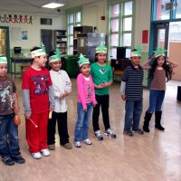 12/17/10 - Annual Christmas with Santa - Mission Education Center, San Francisco - The second grade class says “Hello” to Santa before performing their song.