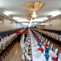 2/20/10 - 27th Annual Crab Feed, Italian American Social Club, San Francisco - Servers putting on the finishing touches in the back dining room.