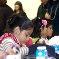 11/19/10 - Annual Thanksgiving Luncheon - Mission Education Center, San Francisco - Students enjoying their first American Thanksgiving.