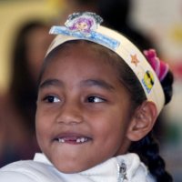 11/19/10 - Annual Thanksgiving Luncheon - Mission Education Center, San Francisco - Student enjoying her first American Thanksgiving.