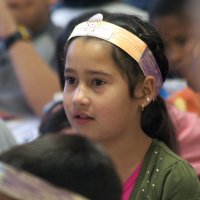 11/19/10 - Annual Thanksgiving Luncheon - Mission Education Center, San Francisco - Student enjoying her first American Thanksgiving.