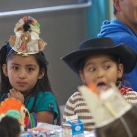 11/19/10 - Annual Thanksgiving Luncheon - Mission Education Center, San Francisco - Students enjoying their first American Thanksgiving.