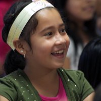 11/19/10 - Annual Thanksgiving Luncheon - Mission Education Center, San Francisco - Student enjoying her first American Thanksgiving.