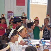 11/19/10 - Annual Thanksgiving Luncheon - Mission Education Center, San Francisco - Students performing a musical number for everyone.