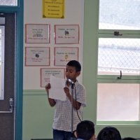 11/19/10 - Annual Thanksgiving Luncheon - Mission Education Center, San Francisco - A student reading his “I’m Thankful” essay.