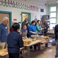 11/19/10 - Annual Thanksgiving Luncheon - Mission Education Center, San Francisco - Behind the table preparing to dish up the food is, l to r: Al Gentile, Arline Thomas, Robert Quinn (in doorway), and, near wall, Aaron Straus, and Bre Jones, among many others.