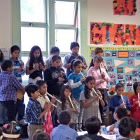 11/19/10 - Annual Thanksgiving Luncheon - Mission Education Center, San Francisco - Students performing a musical number for everyone.