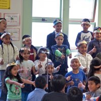 11/19/10 - Annual Thanksgiving Luncheon - Mission Education Center, San Francisco - Students performing a musical number for everyone.