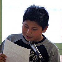 11/19/10 - Annual Thanksgiving Luncheon - Mission Education Center, San Francisco - A student reading his “I’m Thankful” essay.