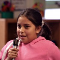 11/19/10 - Annual Thanksgiving Luncheon - Mission Education Center, San Francisco - A student telling those attending why she’s thankful.