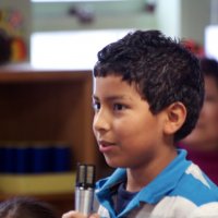 11/19/10 - Annual Thanksgiving Luncheon - Mission Education Center, San Francisco - A student telling those attending why he’s thankful.