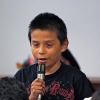 11/19/10 - Annual Thanksgiving Luncheon - Mission Education Center, San Francisco - A student telling those attending why he’s thankful.