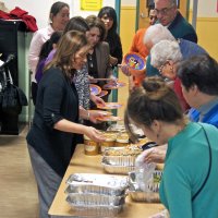 11/19/10 - Annual Thanksgiving Luncheon - Mission Education Center, San Francisco - The food prep line; far end on right side, from the back is: Aaron Straus, Al Gentile, and Arline Thomas.