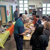 11/19/10 - Annual Thanksgiving Luncheon - Mission Education Center, San Francisco - Dishing it up, left side first three: Aaron Straus, Al Gentile and Arline Thomas. Back near doorway is Robert Quinn looking on.