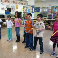 12/16/11 - Annual Christmas with Santa - Mission Education Center, San Francisco - A class making their presentation to Santa.