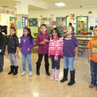 12/16/11 - Annual Christmas with Santa - Mission Education Center, San Francisco - A class singing a song for Santa.