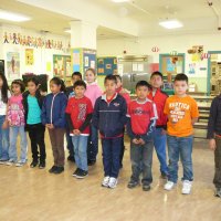 12/16/11 - Annual Christmas with Santa - Mission Education Center, San Francisco - A class nervously lines up before performing for Santa.