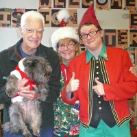 12/16/11 - Annual Christmas with Santa - Mission Education Center, San Francisco - Al Gentile posing with Ms. Linda as Santa, with her dog Emma, and Jackie Cash as her Elf.