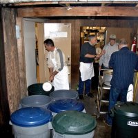 2/19/11 - 28th Annual Castagnetto / Spediacci Memorial Crab Feed - Italian American Social Club, San Francisco - Adding the marinade to the crab first thing in the morning is, l to r: Mike Castagnetto, Jr., Mick Dimas, Al Gentile, and a helper.