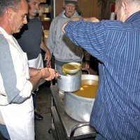 2/19/11 - 28th Annual Castagnetto / Spediacci Memorial Crab Feed - Italian American Social Club, San Francisco - Adding the marinade to the crab first thing in the morning is, l to r: Mike Castagnetto, Jr., Mick Dimas, Al Gentile, and a helper.