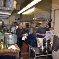 2/19/11 - 28th Annual Castagnetto / Spediacci Memorial Crab Feed - Italian American Social Club, San Francisco - Getting the kitchen up and running are, l to r: helper, Mike Castagnetto, Jr., Mike Castagnetto, helper, and Mick Dimas.