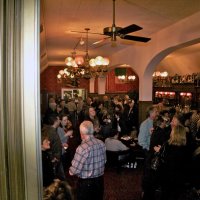 2/19/11 - 28th Annual Castagnetto / Spediacci Memorial Crab Feed - Italian American Social Club, San Francisco - Members and guest enjoying pre-dinner drinks. Standing at left bottom is Diane & Ward Donnelly; also in the crowd is: John Jones and Charlie Bottarini.