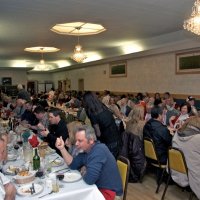 2/19/11 - 28th Annual Castagnetto / Spediacci Memorial Crab Feed - Italian American Social Club, San Francisco - Dinner has begin in the back dining room. Center table, right end, near side is Rick & Kate Wright, with Linda Workman. Also in the room is Al Gentile, and our roaming accordianist.