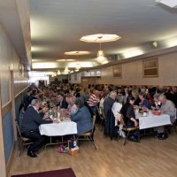 2/19/11 - 28th Annual Castagnetto / Spediacci Memorial Crab Feed - Italian American Social Club, San Francisco - Members and guests finishing up their salads. In the photo are: end of center table: Estelle & Charlie Bottarini; also Dick Johnson, Al Gentile, and George & Kathy Salet.