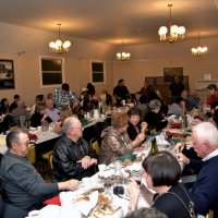 2/19/11 - 28th Annual Castagnetto / Spediacci Memorial Crab Feed - Italian American Social Club, San Francisco - Having eaten all they can, everyone starts to relax. In the photo is: Bill Graziano, Bill Mayta, George Salet, and, this end of the table, Handford & Margot Clews.