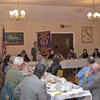 2/16/11 - Annual Student Speaker Contest - Topic: “Enforcing Our Borders: State versus Federal Rights” - Italian American Social Club, San Francisco - A full house looks on as Paul Corvi reads the contest rules. Near table; left side, front to back: Bob Fenech, Robert Quinn, Ward Donnelly, Emily Powell, Enrico Micheli, Mike Castagnatto, and Charles Bottarini; far side: Bill Graziano, George Salet, and Emily & Joe Farrah; head table, l to r: Bill Stipinovich, Paul Corvi, Bre Jones, speakers: Jason Wu, Stephanie Sin, and Catherine Suen; left side: l to r: Handford Clews, John Propster, and Terence Abad.