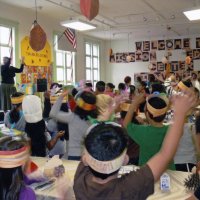 11/18/11 - Annual Thanksgiving Luncheon - Mission Education Center, San Francisco - Students signal they’re ready to begin and join in.