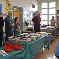 11/18/11 - Annual Thanksgiving Luncheon - Mission Education Center, San Francisco - Helpers look on as students perform. Behind table, front to back: Jackie Cash, Al Gentile, cafeteria helper, Robert Quinn; along back: Charlie Bottarini, and Joe & Emily Farrah.