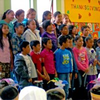 11/18/11 - Annual Thanksgiving Luncheon - Mission Education Center, San Francisco - A class performing for the crowd of students and guests.