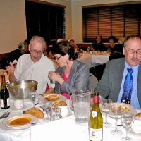 12/19/12 - Club Christmas Party at the Basque Clutural Center, South San Francisco - Near table, l to r: Lyle Workman, Kathy & George Salet; head table on left: Bill Graziano, and Mike Castagnetto.