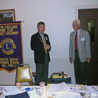 7/18/12 - Installation of Officers at the Italian American Social Club, San Francisco - PDG Eugene Chan, left, installing Al Gentile as Membership Chairman. Looking on are Diane Donnelly, on left, and Joe Farrah, on right.