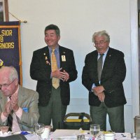 7/18/12 - Installation of Officers at the Italian American Social Club, San Francisco - Standing is PDG Eugene Chan, on left, installing Joe Farrah as Secretary. Seated is Ward Donnelly (outgoing President).