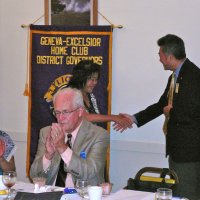 7/18/12 - Installation of Officers at the Italian American Social Club, San Francisco - Standing is PDG Eugene Chan, on right, congratulating May Wong as the installed 2nd Vice President. Seated are Diane & Ward Donnelly (outgoing President).