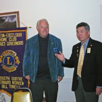 7/18/12 - Installation of Officers at the Italian American Social Club, San Francisco - PDG Eugene Chan, on right, gives Bob Quinn his charge as Incoming President.