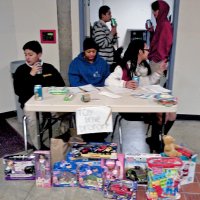 12-19-12 - Leo Toy Drive at Ephphany School Gym with collected toys delivered to the Moscow Street Firehouse.