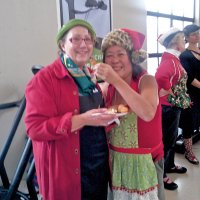 12-1-12 - Leo meeting, decorating party, and Bike Givaway. May Wong giving her buddy a treat.