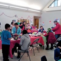 12-1-12 - Leo meeting, decorating party, and Bike Givaway. Sharon Eberhardt in back on left.