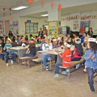 11-16-12 - Thanksgiving Luncheon, Mission Educational Center, San Francisco - Students applaud those being introduced.