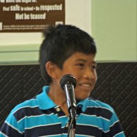 11-16-12 - Thanksgiving Luncheon, Mission Educational Center, San Francisco - A student tells his story, and how he came to America.