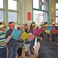 11-16-12 - Thanksgiving Luncheon, Mission Educational Center, San Francisco - Students sing a song led by their teacher.