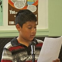 11-16-12 - Thanksgiving Luncheon, Mission Educational Center, San Francisco - A student tells his story, and how he came to America.